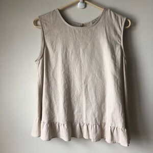 Charlie Paige linen top sleeveless with open back and ruffle trim light tan
